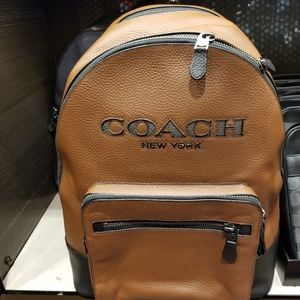 Coach Backpack 695 retail tag attaches
